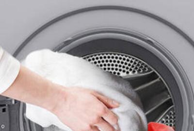 羊毛的衣物能用洗衣机洗么,洗衣机羊毛功能可以洗大衣吗